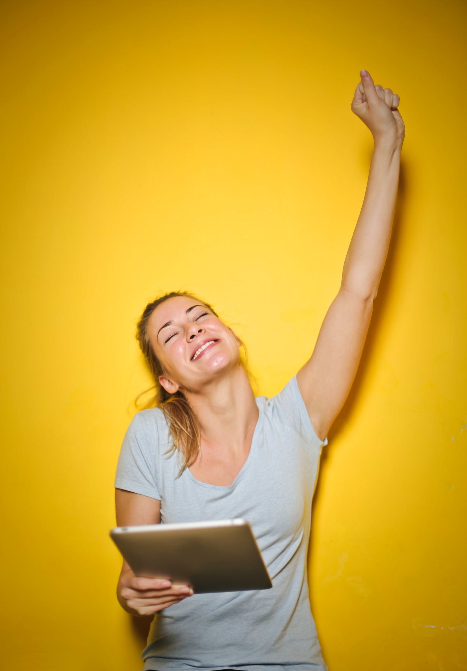 Happy girl with ipad